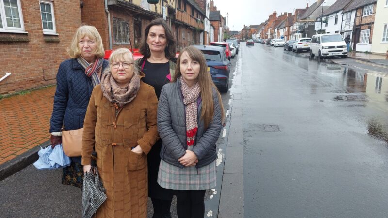 Cllrs Rachel Burgess and Marie-Louise Weighill with residents in Rose Street.