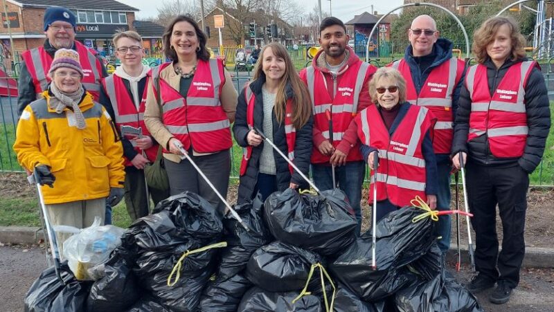 Marie-Louise, Rachel and Nagi with residents and volunteers at our litter pick in January 2024.